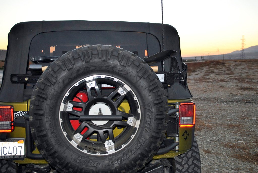 Jeep spare tire carrier jerry can mount